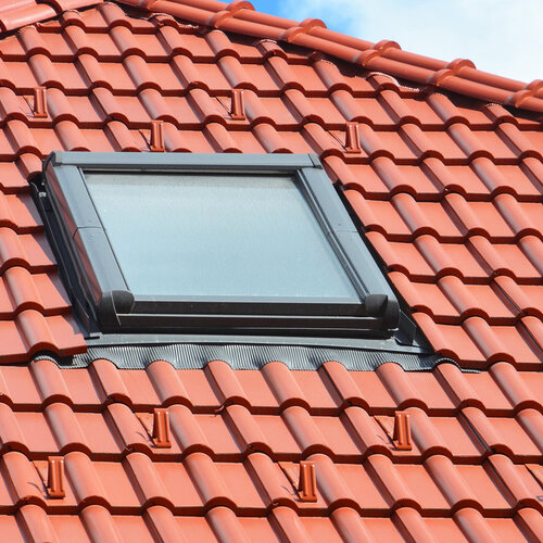 close-up of a skylight on a tile roof