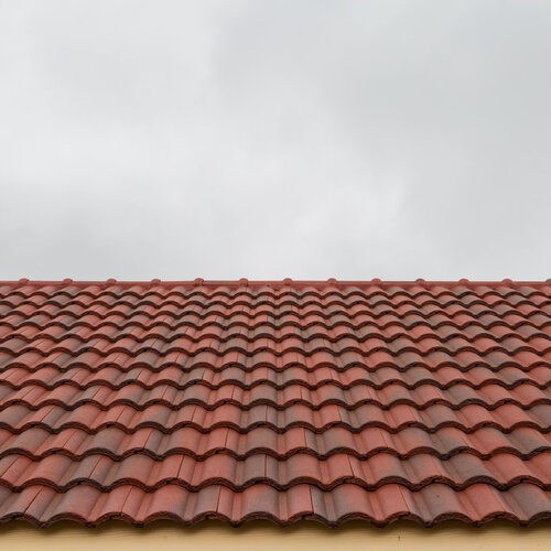 roof covered in overlapping red tiles