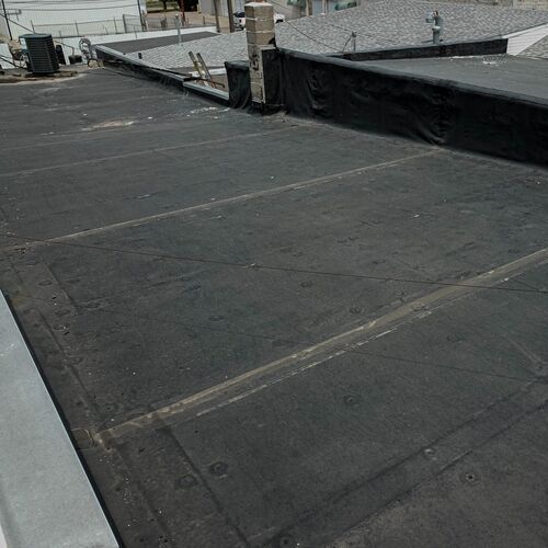 close-up of a flat roofing system completed by Hometown