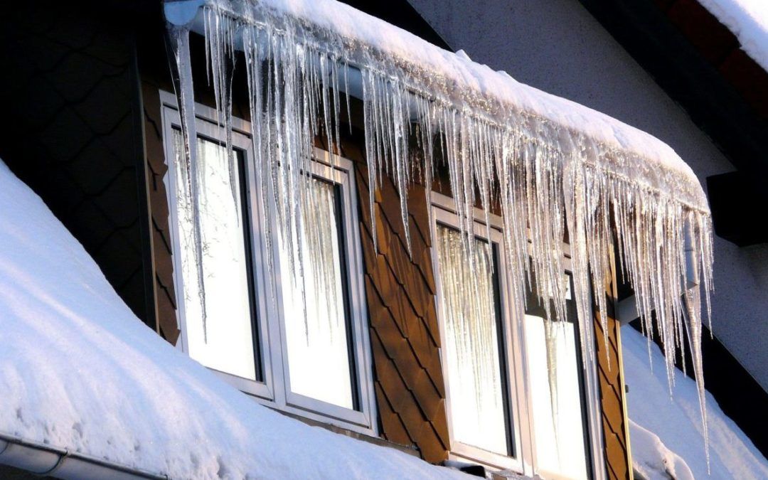 icicles over a home's window
