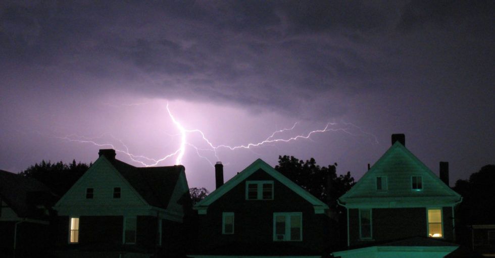 lighning over three homes