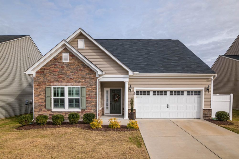 home with beige vinyl siding