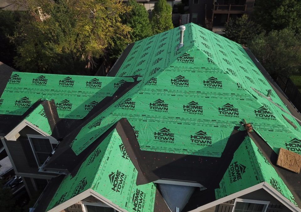 green synthetic felt on a home's roof