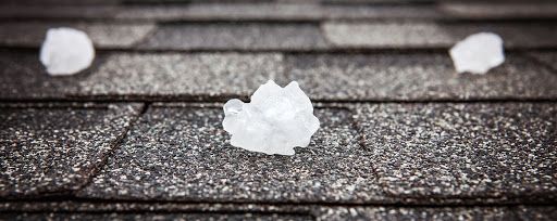 hailstones on asphalt shingles