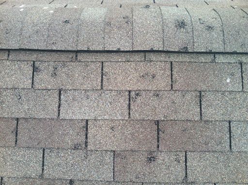 close-up of hail-damaged shingles